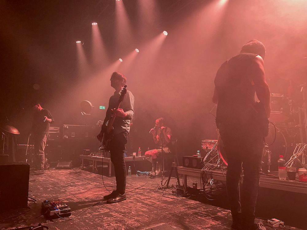 Four members of The Ocean live on stage